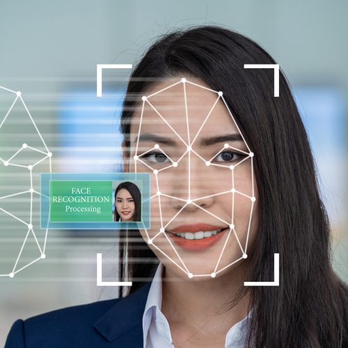 Asian women using Face detection and recognition technology for access permission